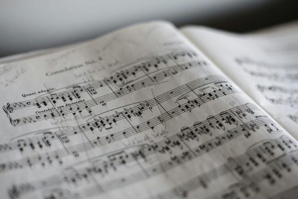 Sheet music laying open on a music stand